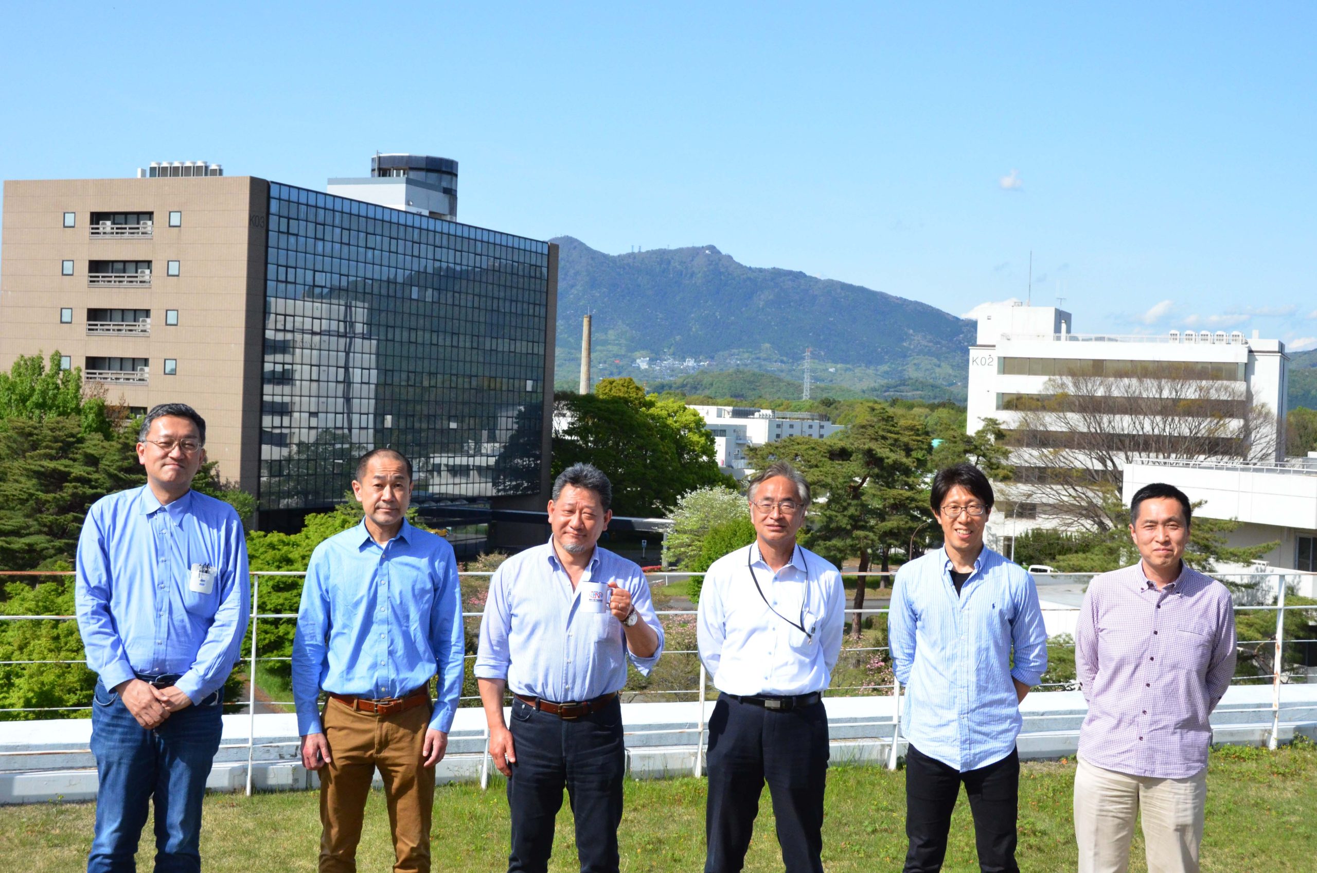 IPNS Director: SAITO, Naohito<br />
(the third from the left),<br />
Deputy Director: KOMATSUBARA, Takeshi, HANAGAKI, Kazunori (hold Detector R&D Center Head), UNO, Shoji,<br />
Engineering Coordinator: KAWAI, Masanori,<br />
Theory Center Head: HASHIMOTO, Shoji<br />
(from the left).
